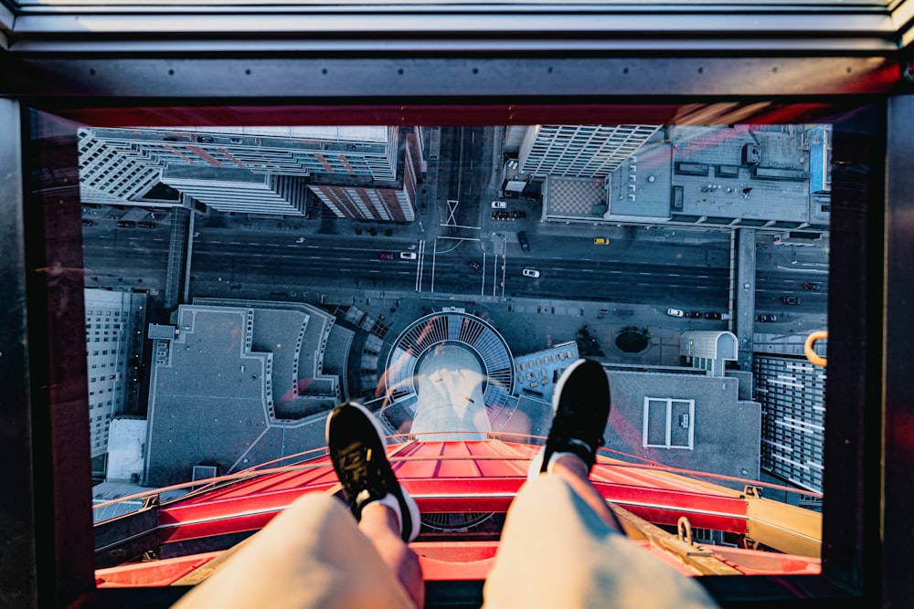 a person standing on top of a glass floor