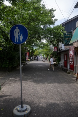A peaceful pedestrian-friendly ground floor with greenery and no vehicles, perfect for families and children.