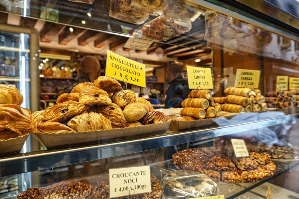 a bakery filled with lots of different types of pastries