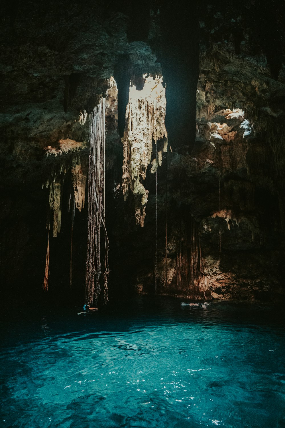 a body of water inside of a cave