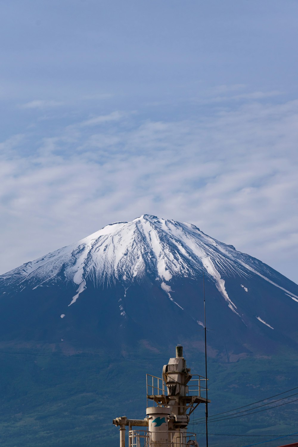 a snow covered mountain in the distance