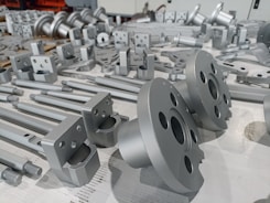 Precision-engineered metal parts arranged neatly in a factory setting