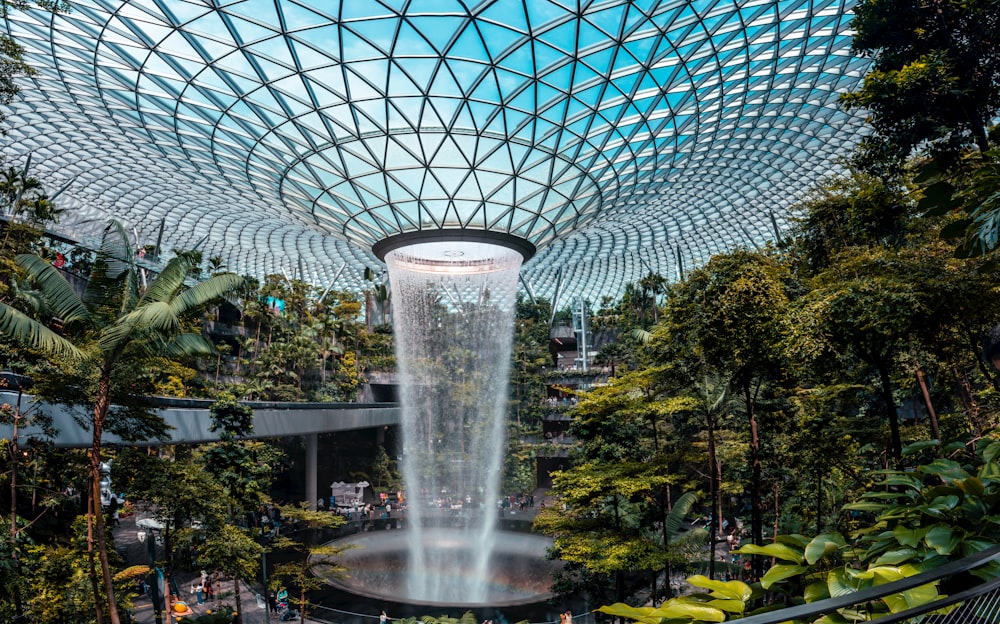 a large waterfall in the middle of a building