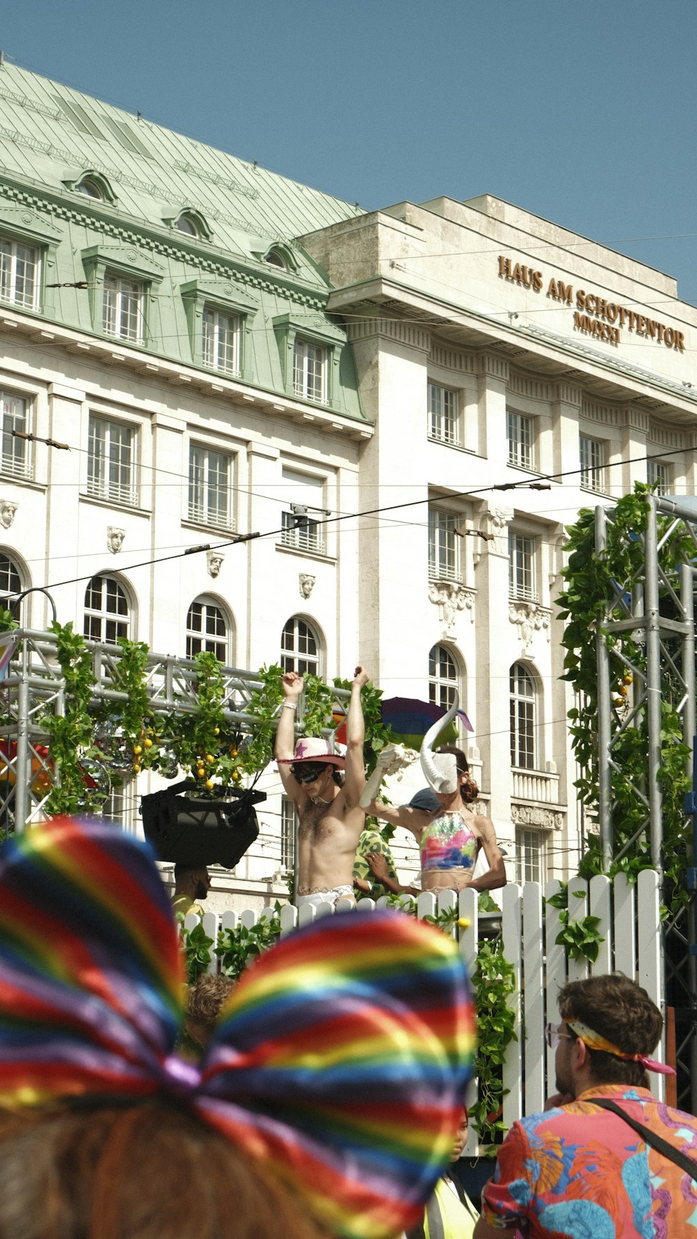 a group of people standing in front of a building