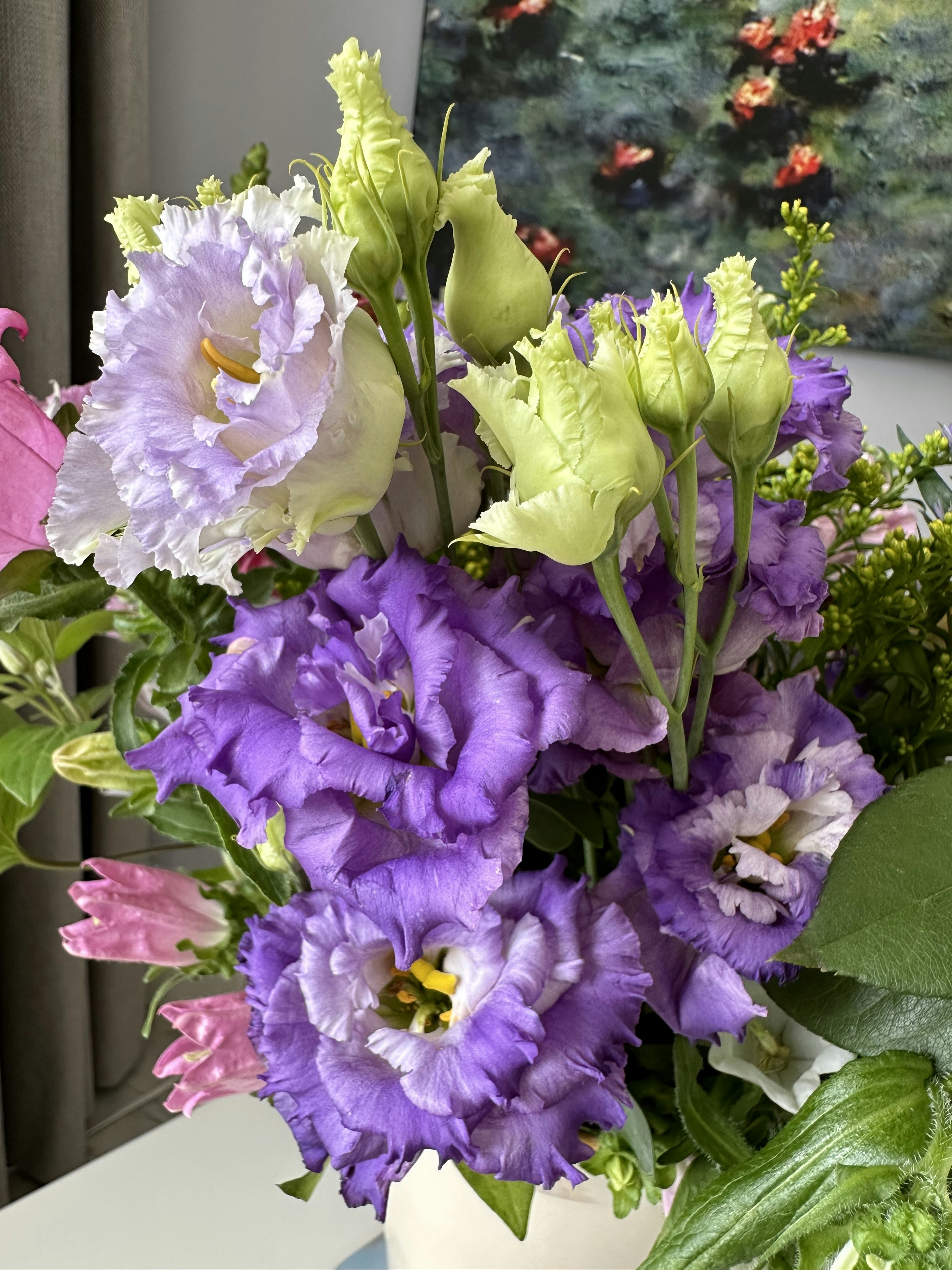 Soft lavender and purple mixed bouquet with lisianthus and roses