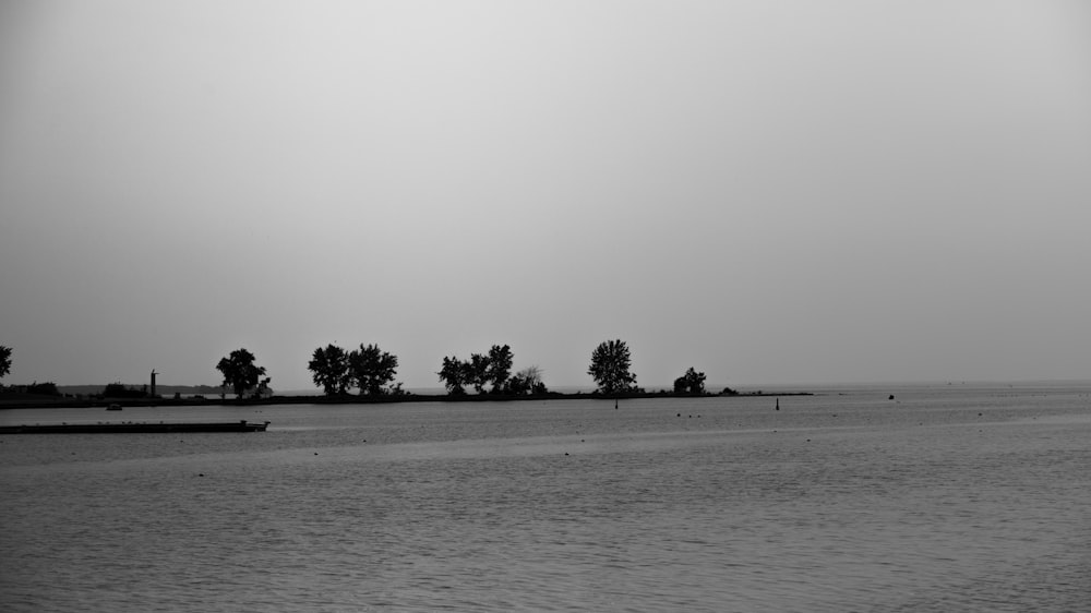 a black and white photo of a body of water