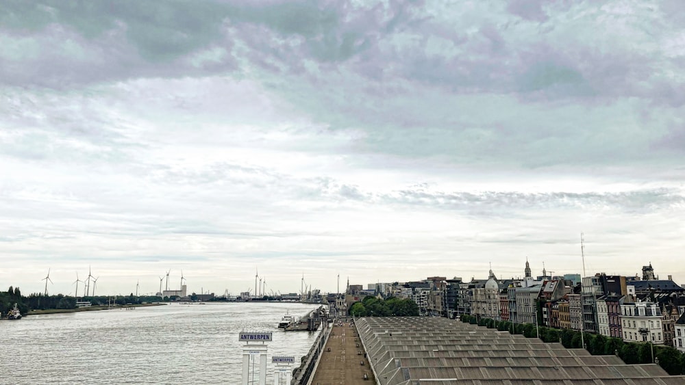 a large body of water next to a city