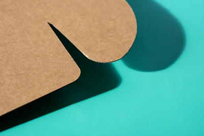 a piece of cardboard sitting on top of a table