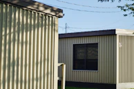 a couple of buildings sitting next to each other
