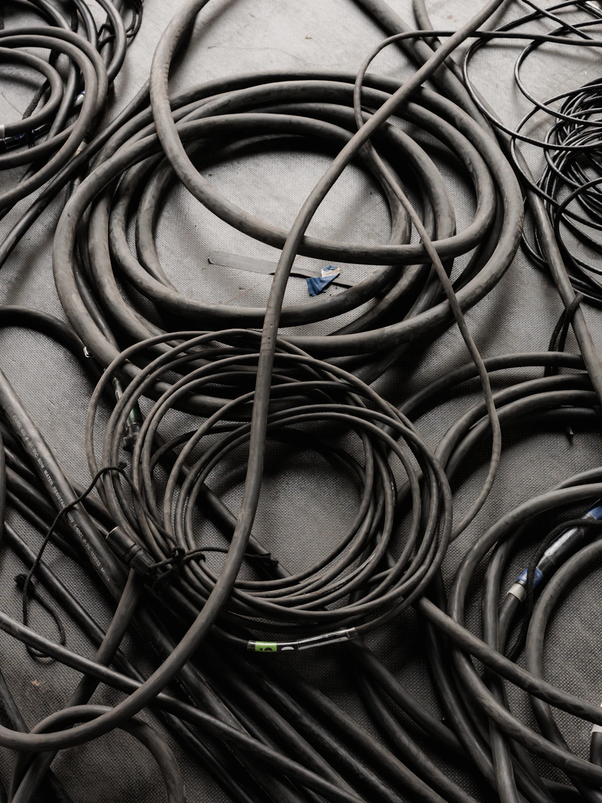 Cables left tangled behind an appliance