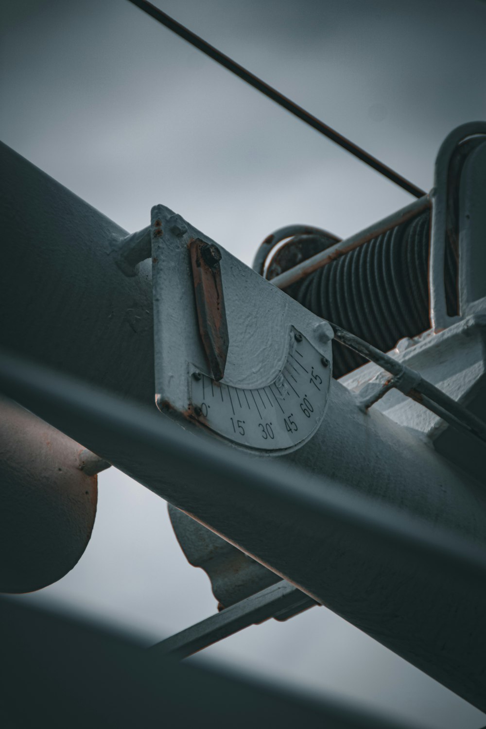 a close up of a clock on a pole