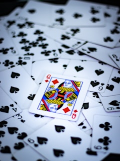a table topped with lots of playing cards