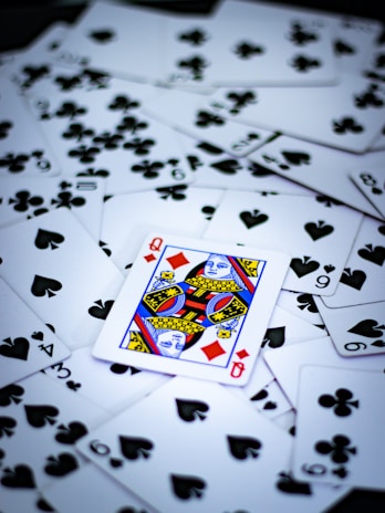 a table topped with lots of playing cards
