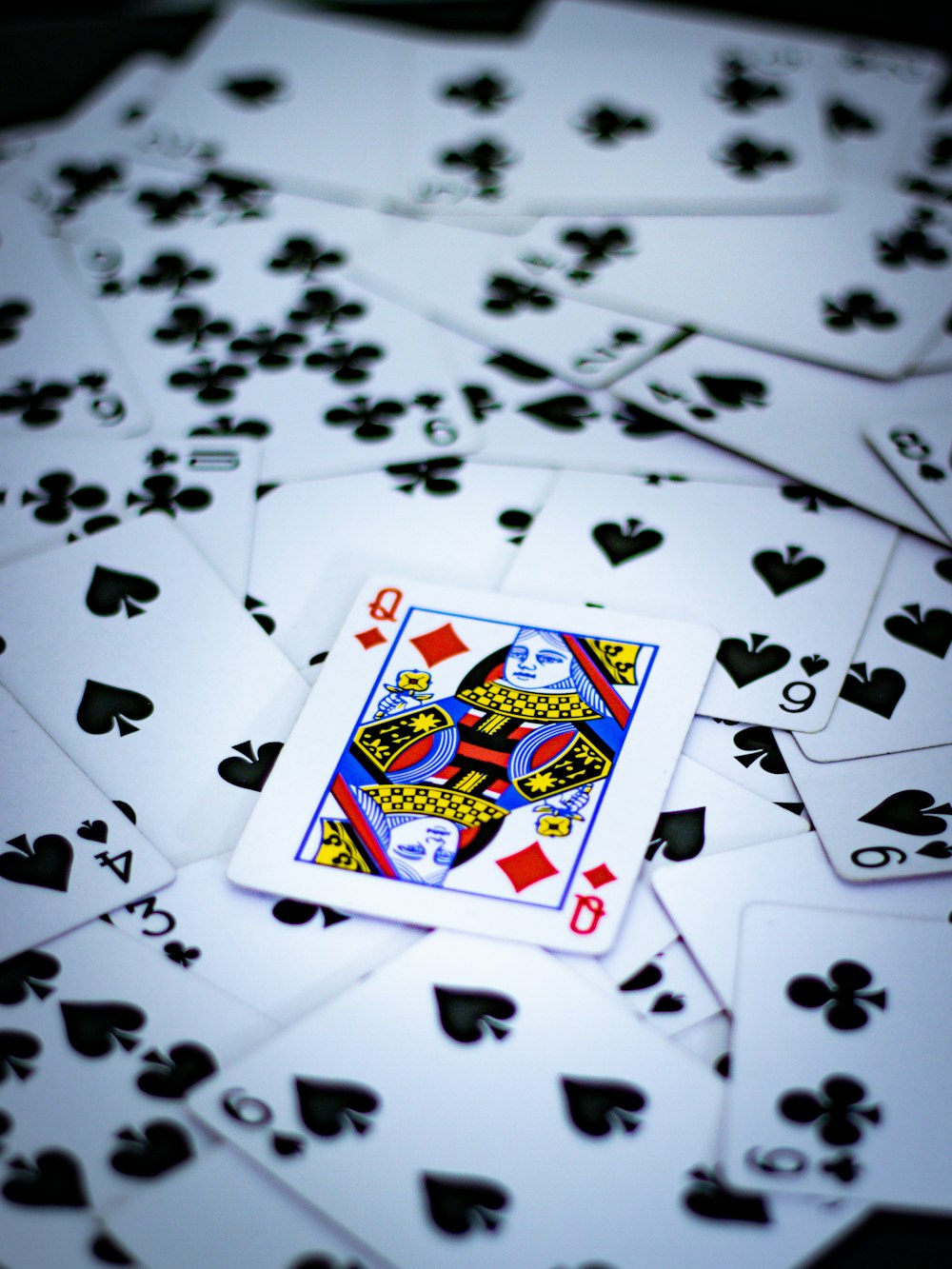 a table topped with lots of playing cards