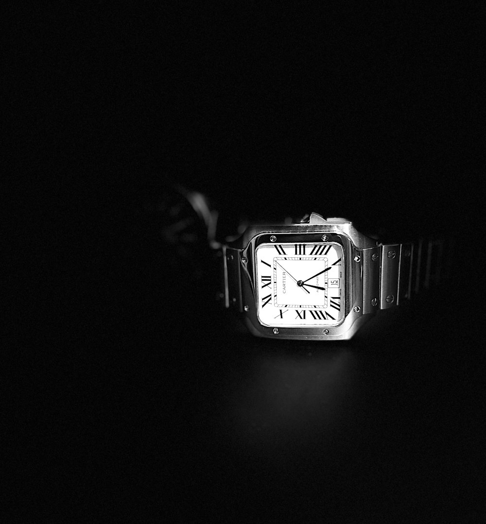 a close up of a wrist watch on a table