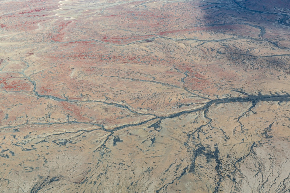 an aerial view of a river in the desert