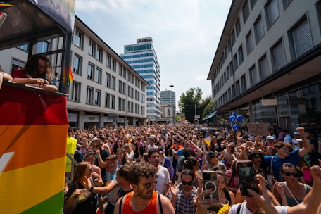 a large group of people standing in front of a building