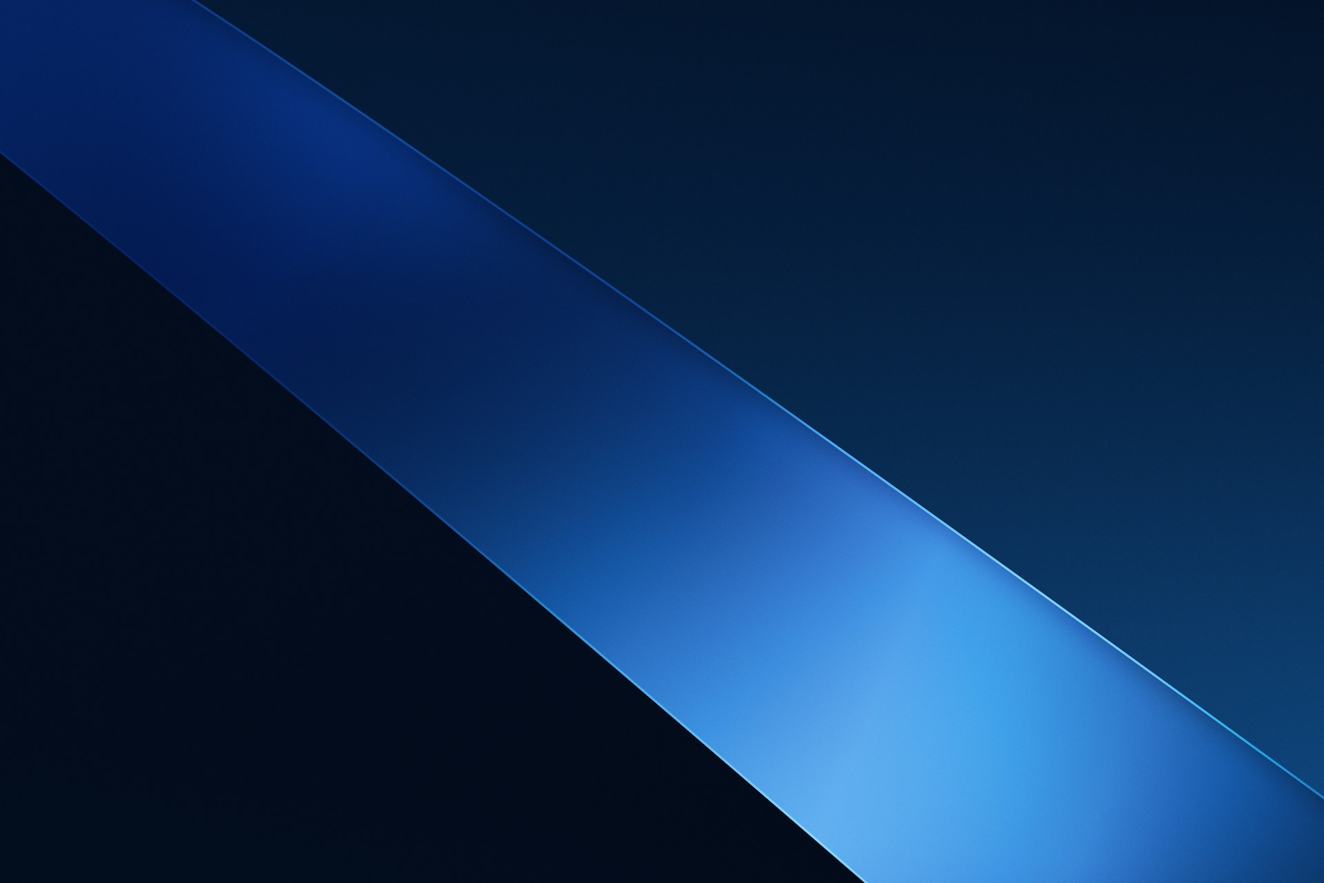 a close up of a blue and black background