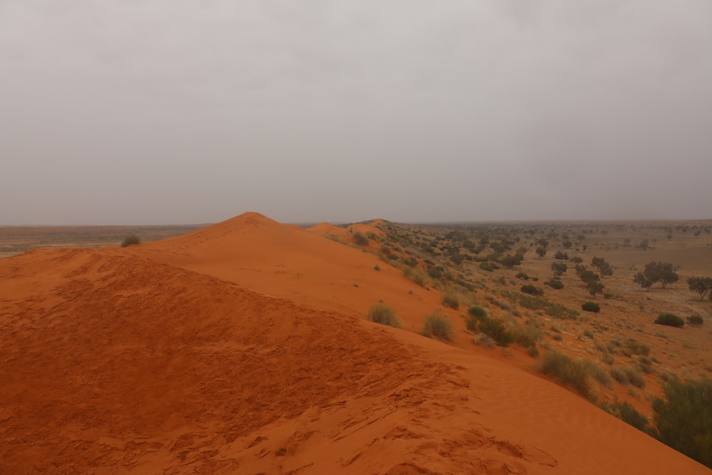 a large sand dune in the middle of a desert