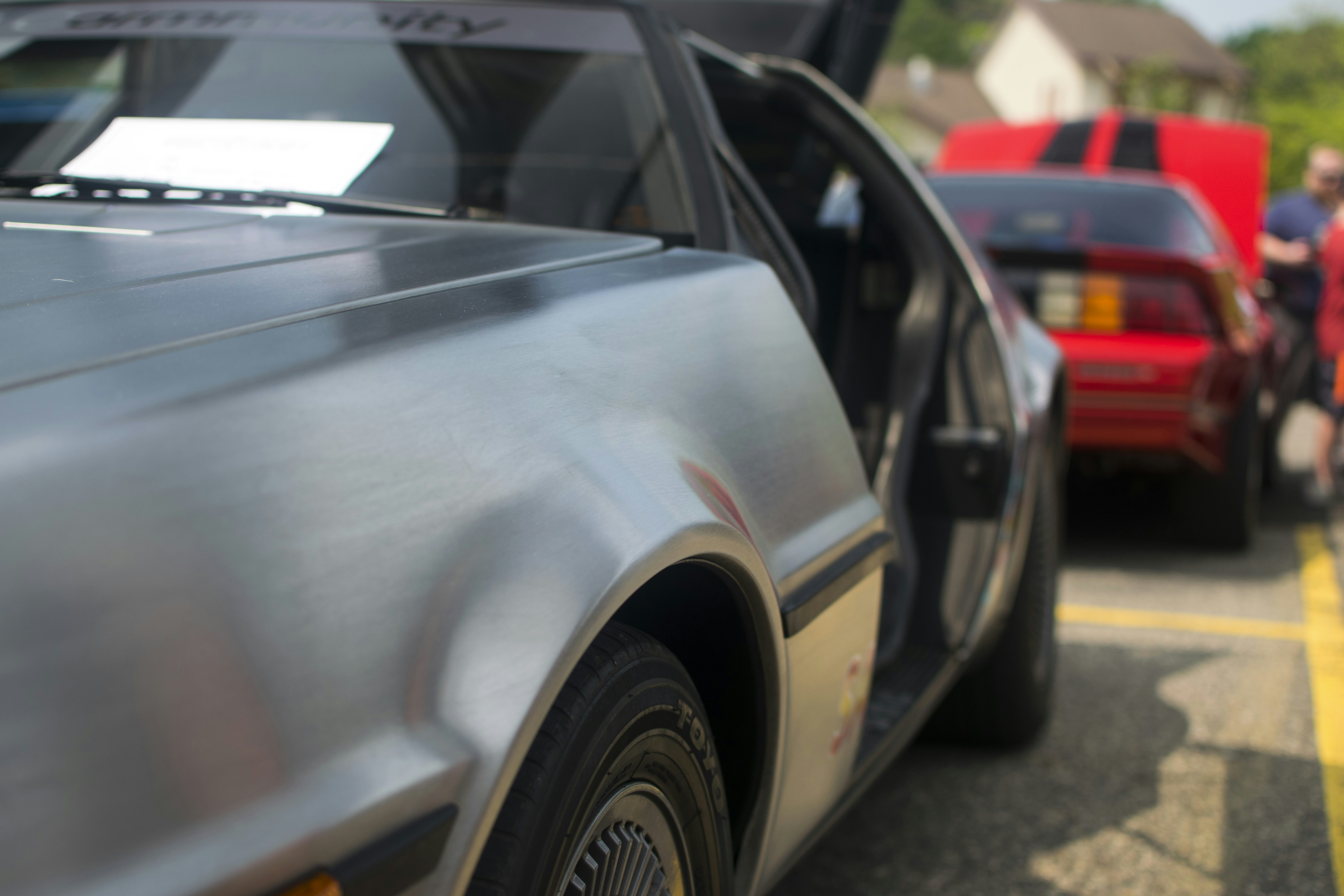 a group of cars parked on the side of a road
