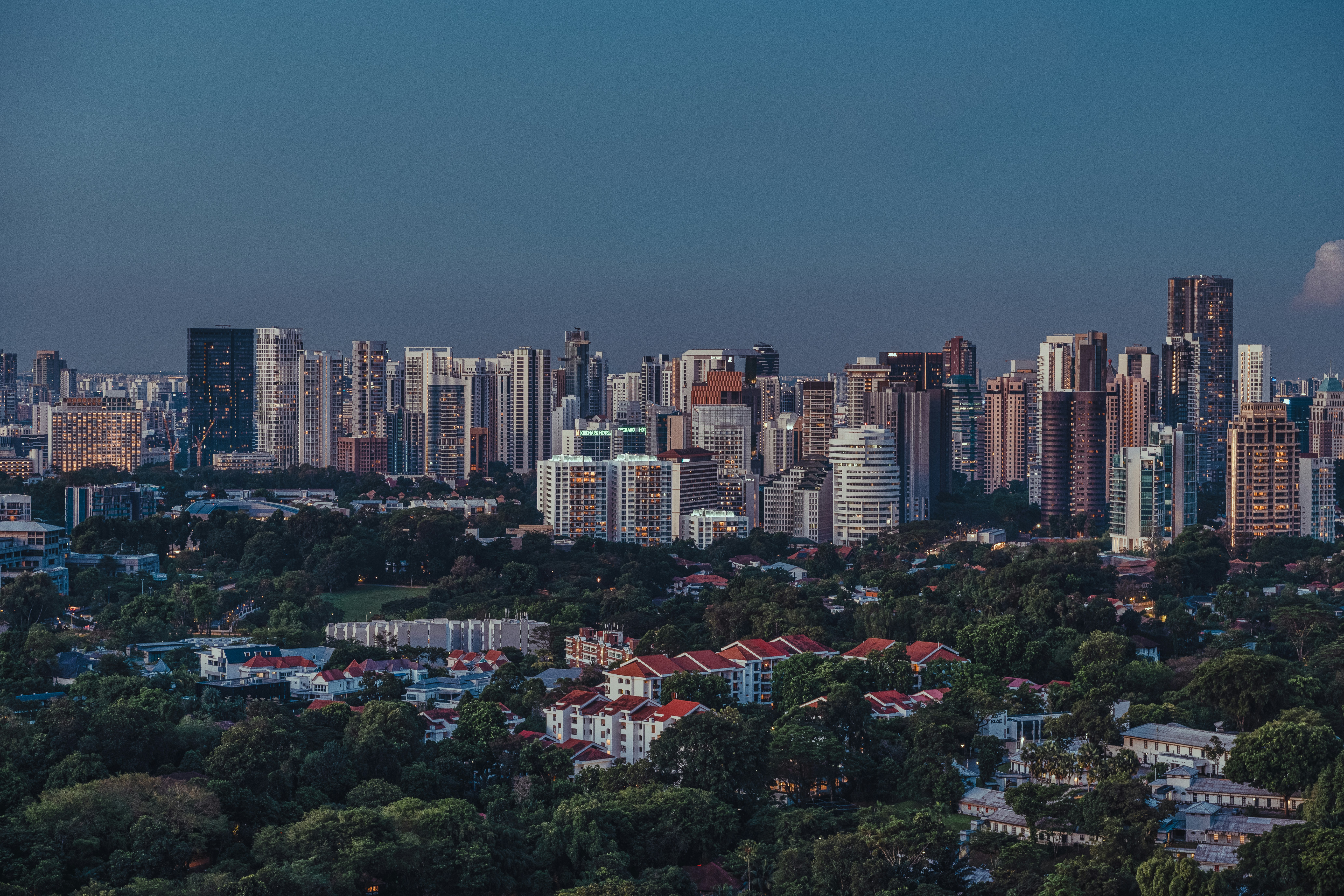 a view of a city with tall buildings