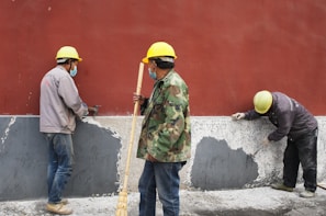 a group of men standing next to each other