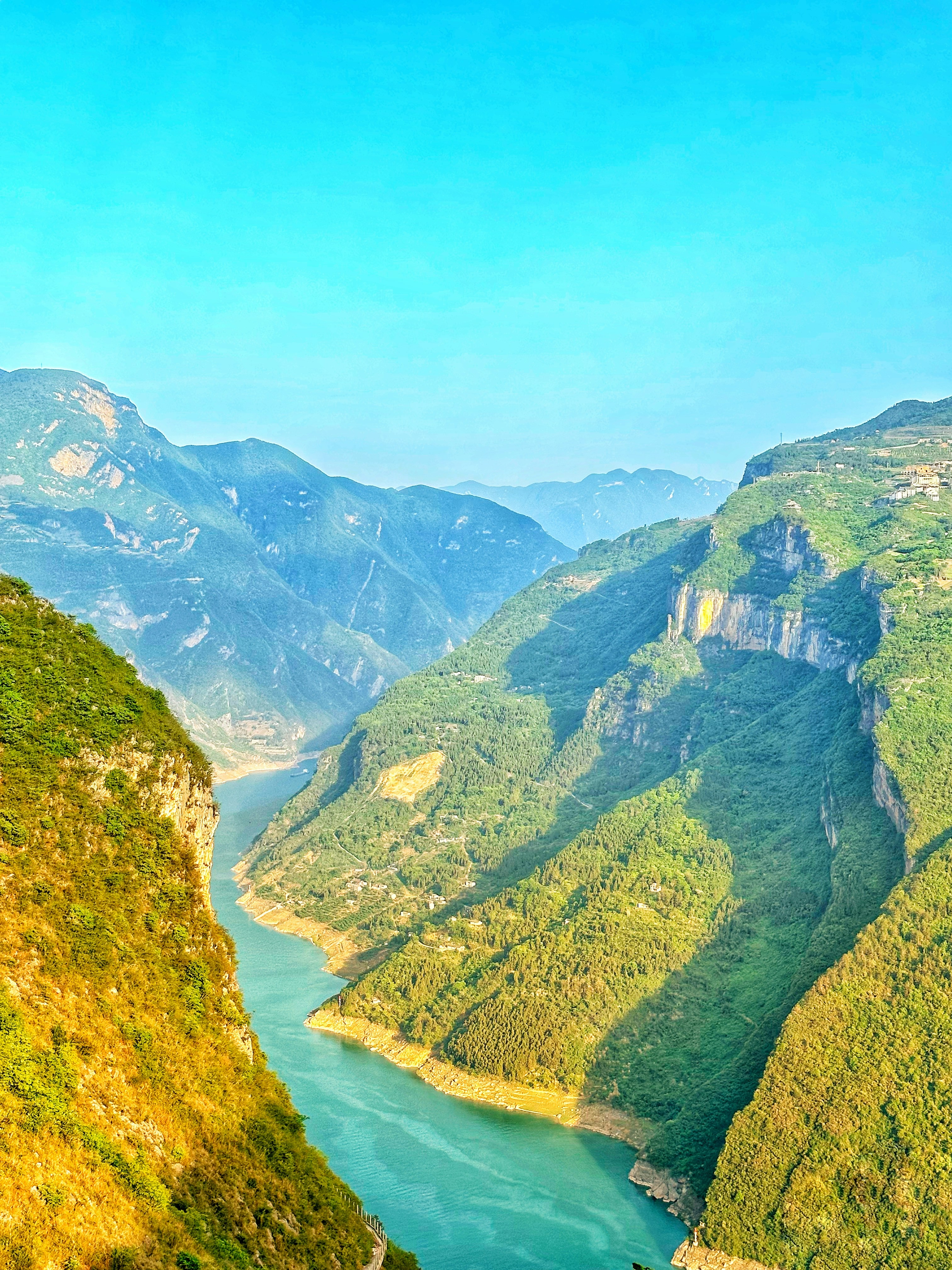 a scenic view of a river running through a valley