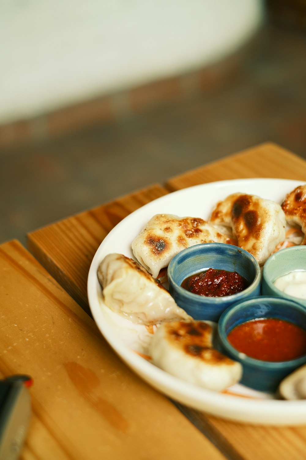 a plate of food on a wooden table