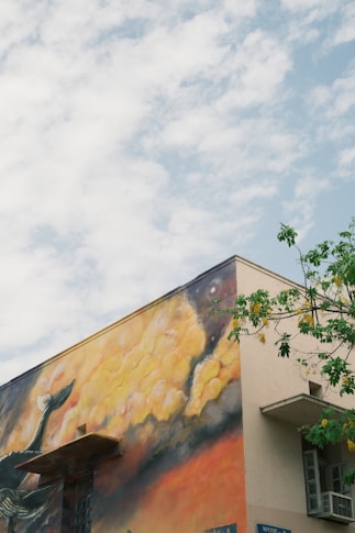 a large mural on the side of a building
