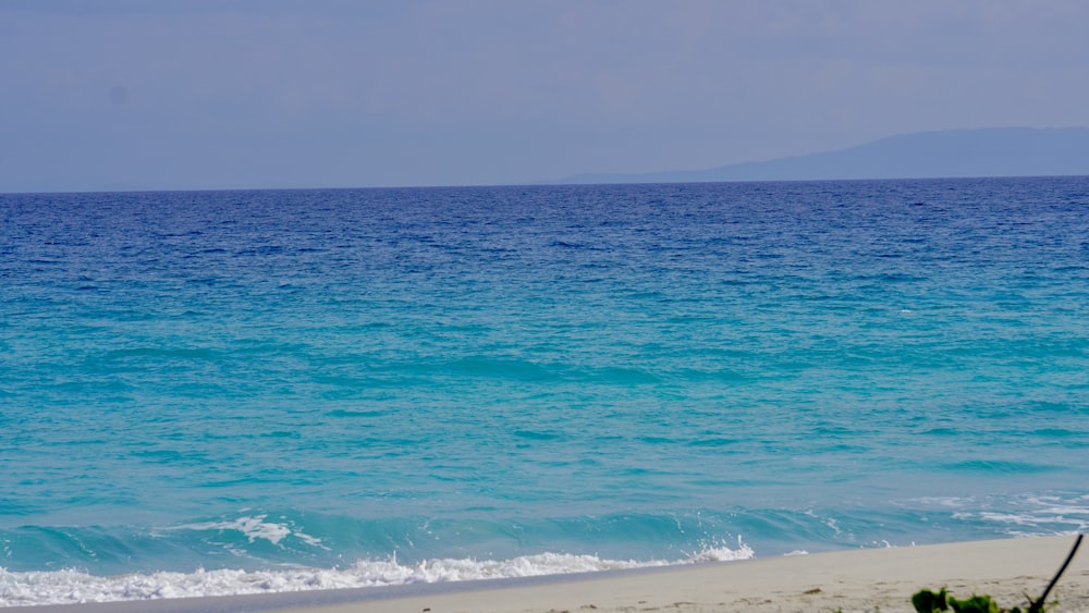 a view of the ocean from a beach