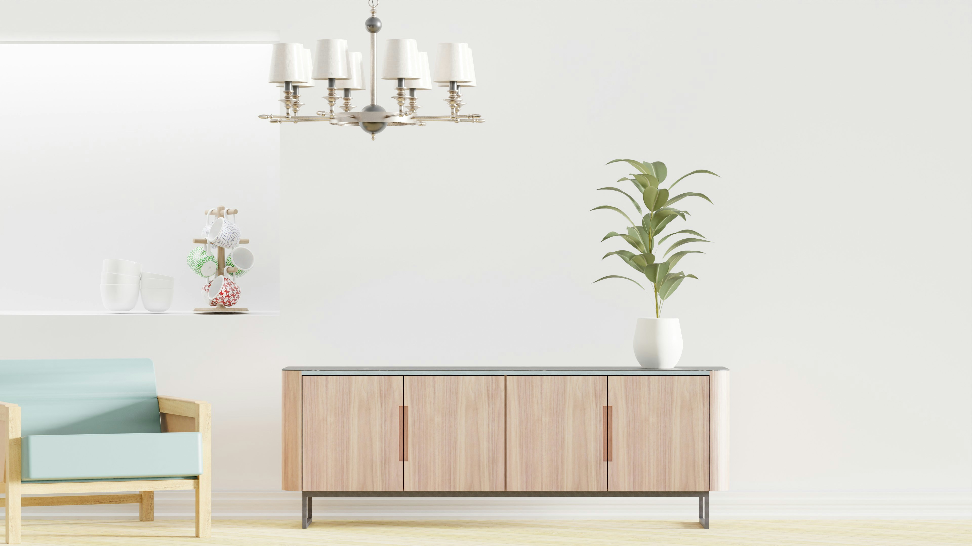 a living room with a couch, a chair and a potted plant