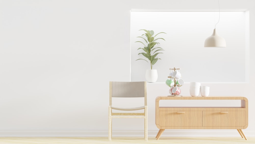 uma sala branca com uma cadeira e uma mesa