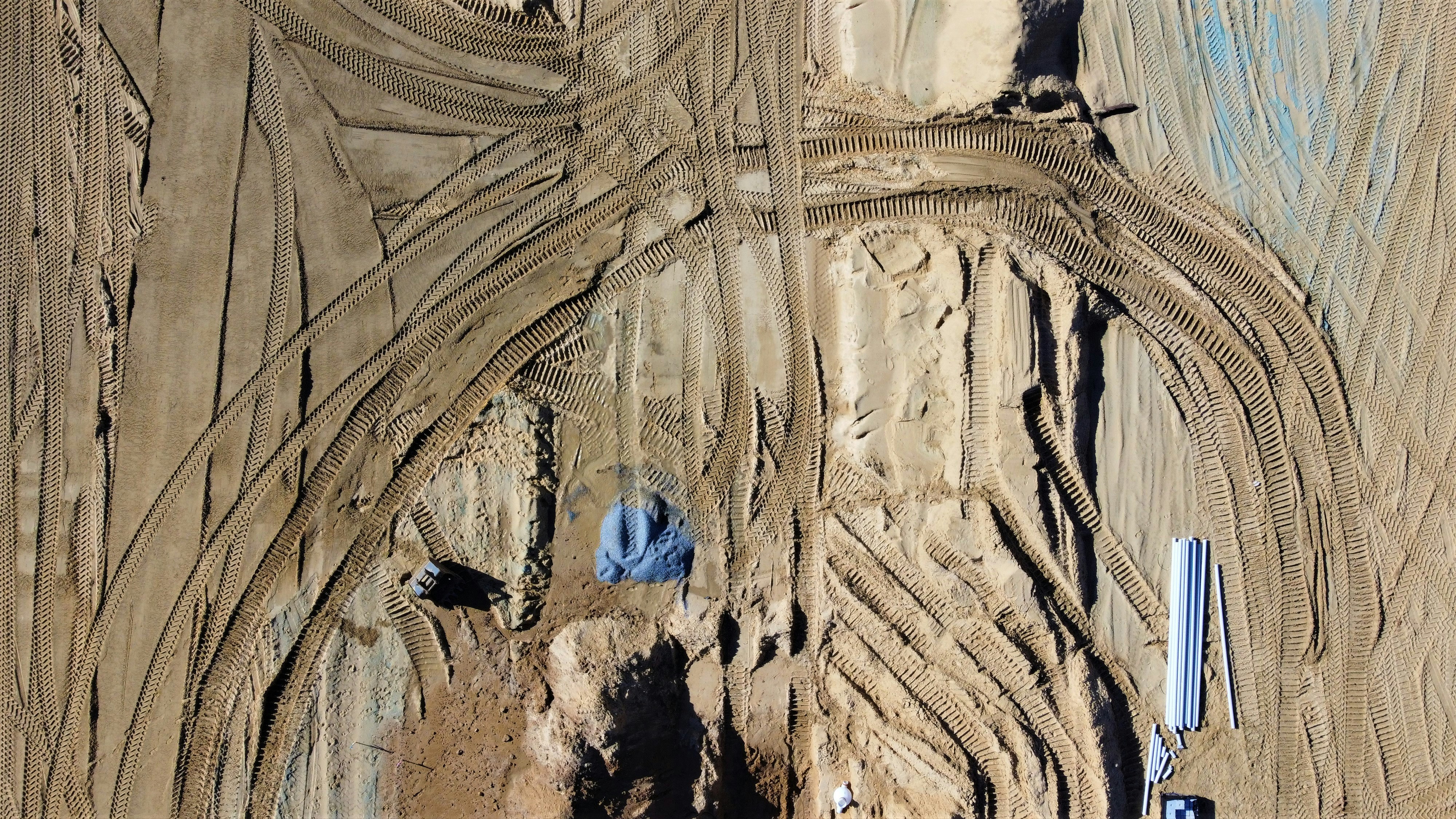 woman wearing yellow long-sleeved dress under white clouds and blue sky during daytime