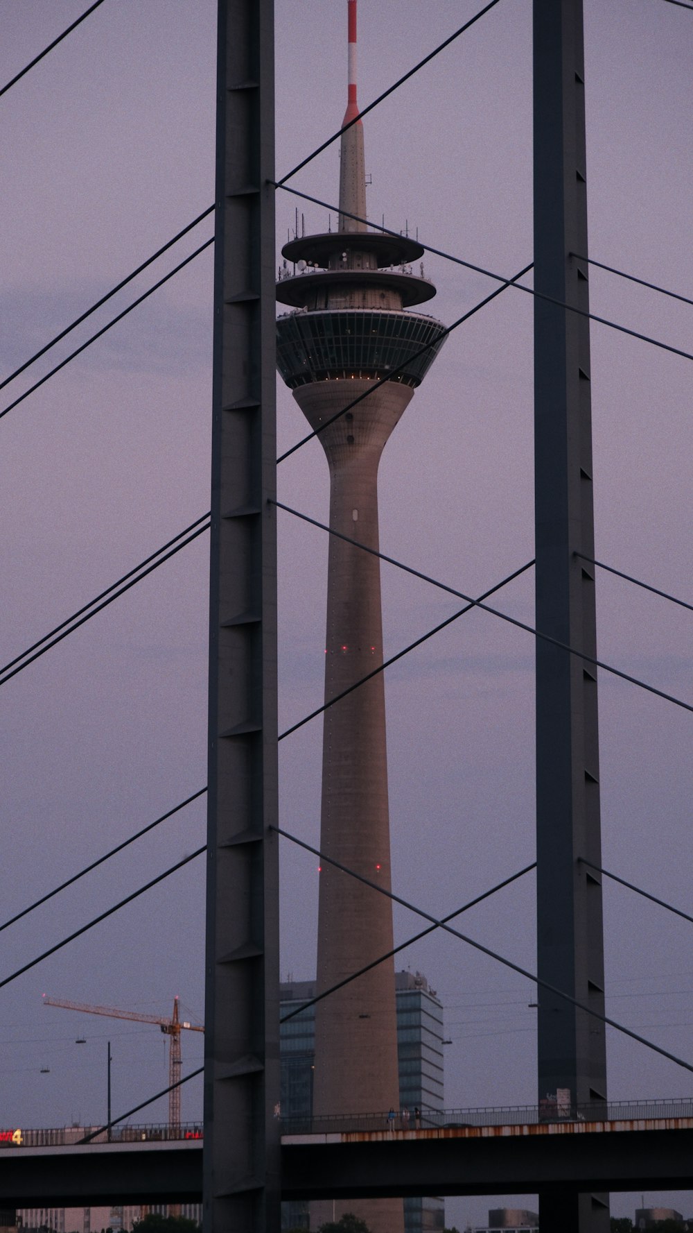 a very tall tower towering over a city