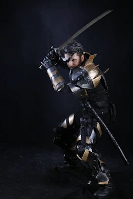 Square image featuring a Mu Online warrior in full armor ready for combat.