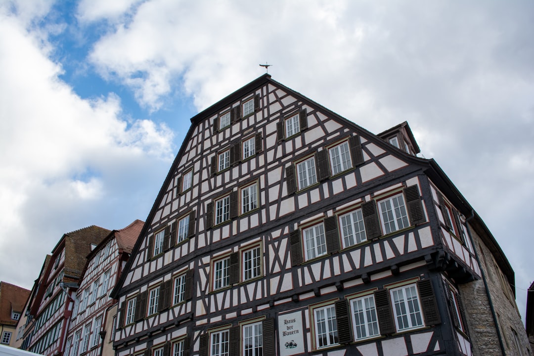 a tall building with lots of windows on the side of it