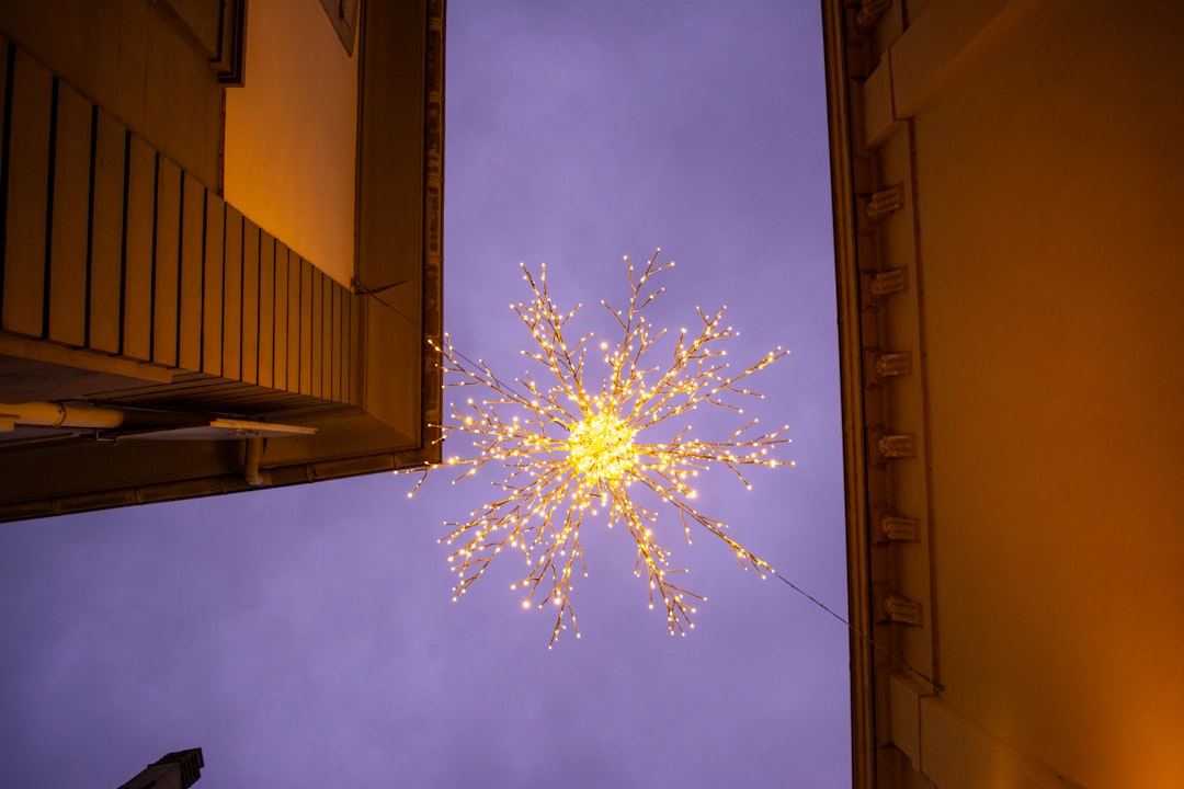 a snowflake is seen in the sky above a building