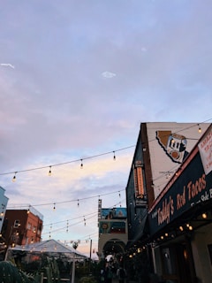 A cozy street corner in Tlalpan with warm evening light and colorful murals.