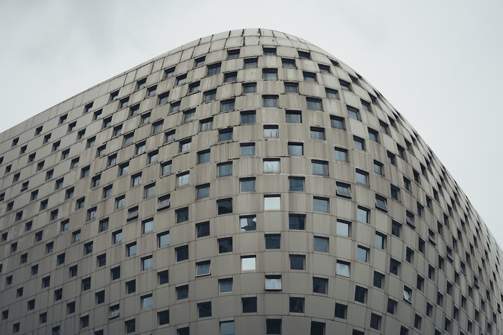 a very large building with many windows on it's side