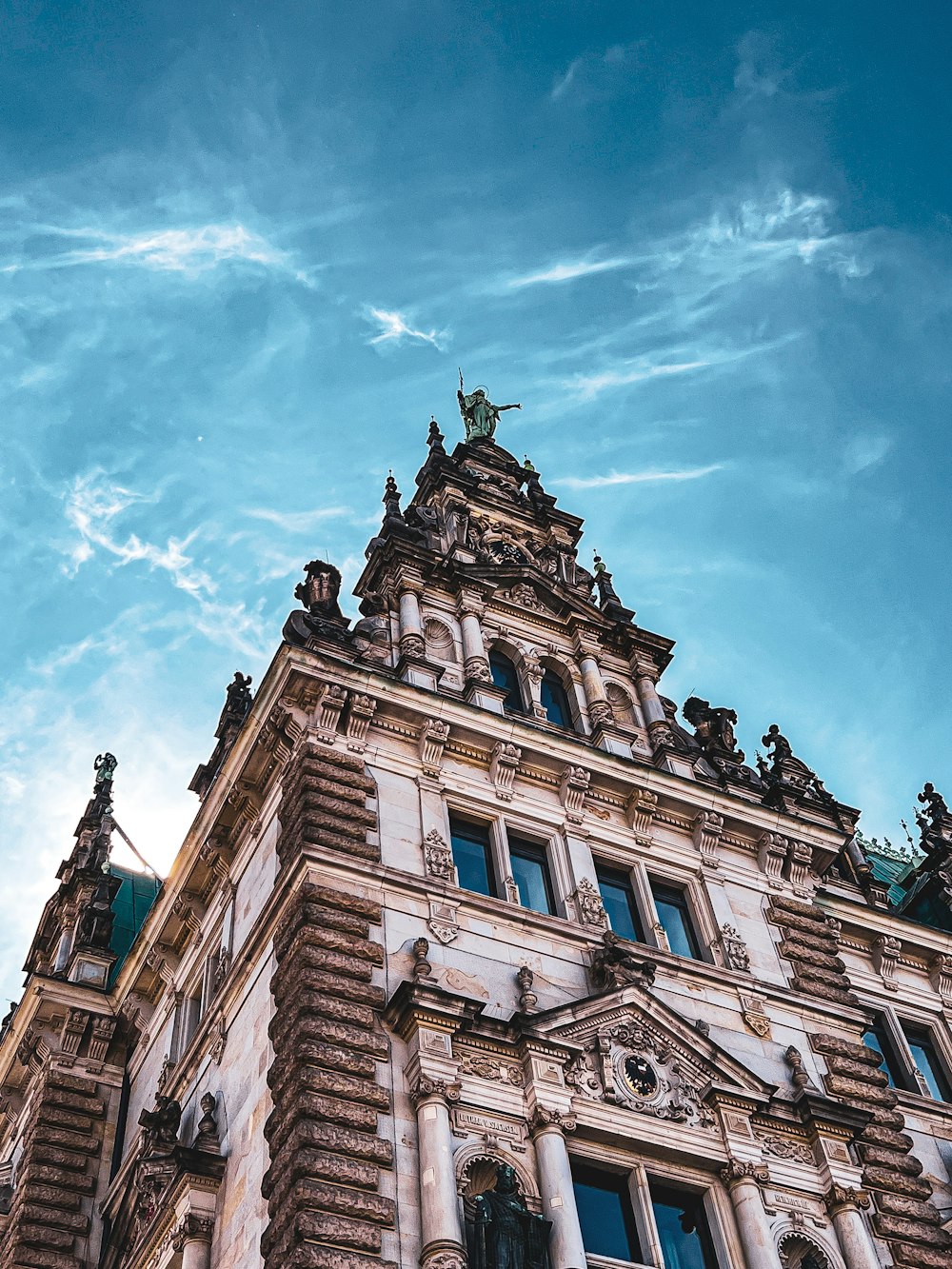 a tall building with a clock on the top of it