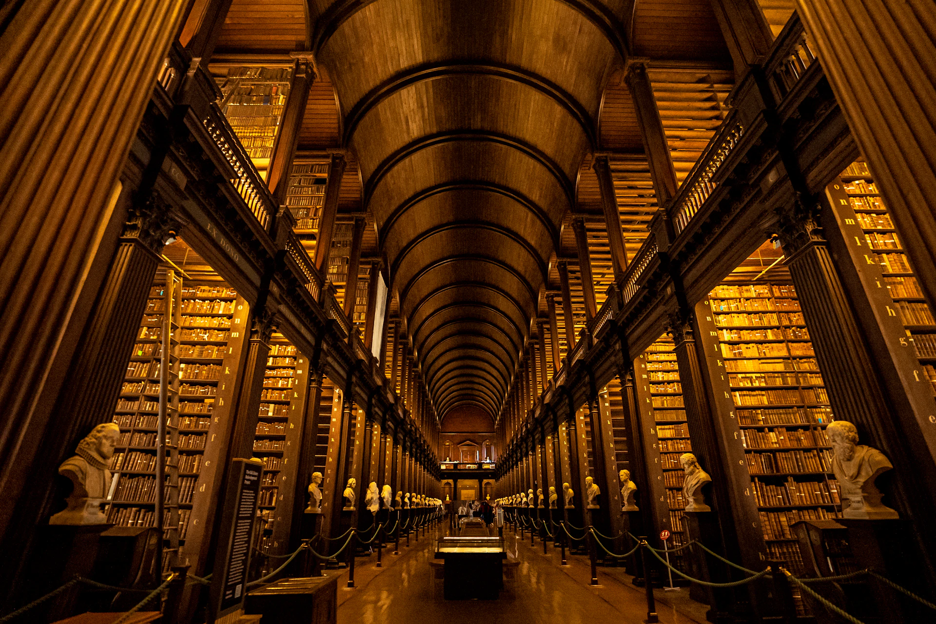 a long room with a lot of books in it