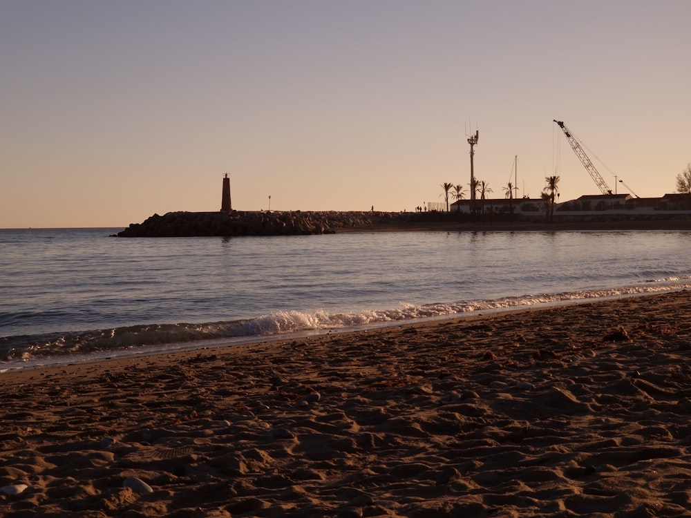 a view of a body of water from a beach