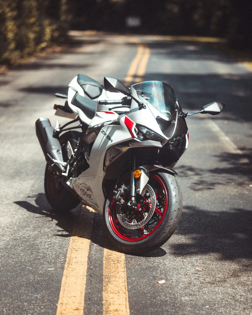 a motorcycle parked on the side of the road