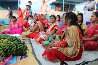 a group of women sitting next to each other