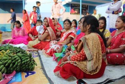 a group of women sitting next to each other