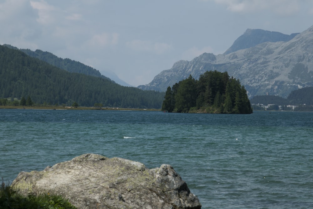 a large body of water surrounded by mountains