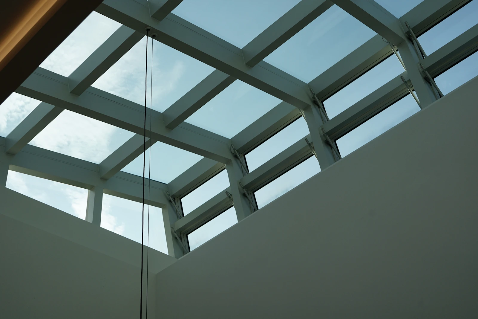 Glazed roof with slim white glazing bars