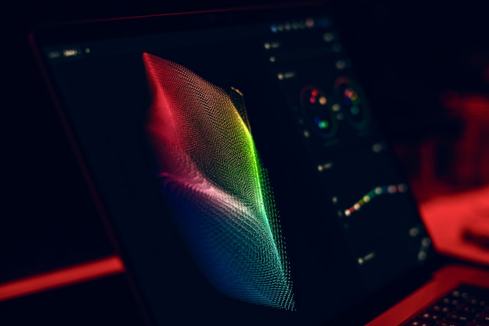 a close up of a laptop with a colorful screen