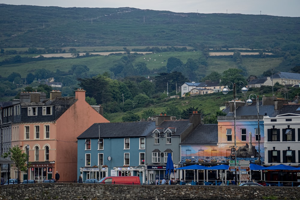 a town with a hill in the background