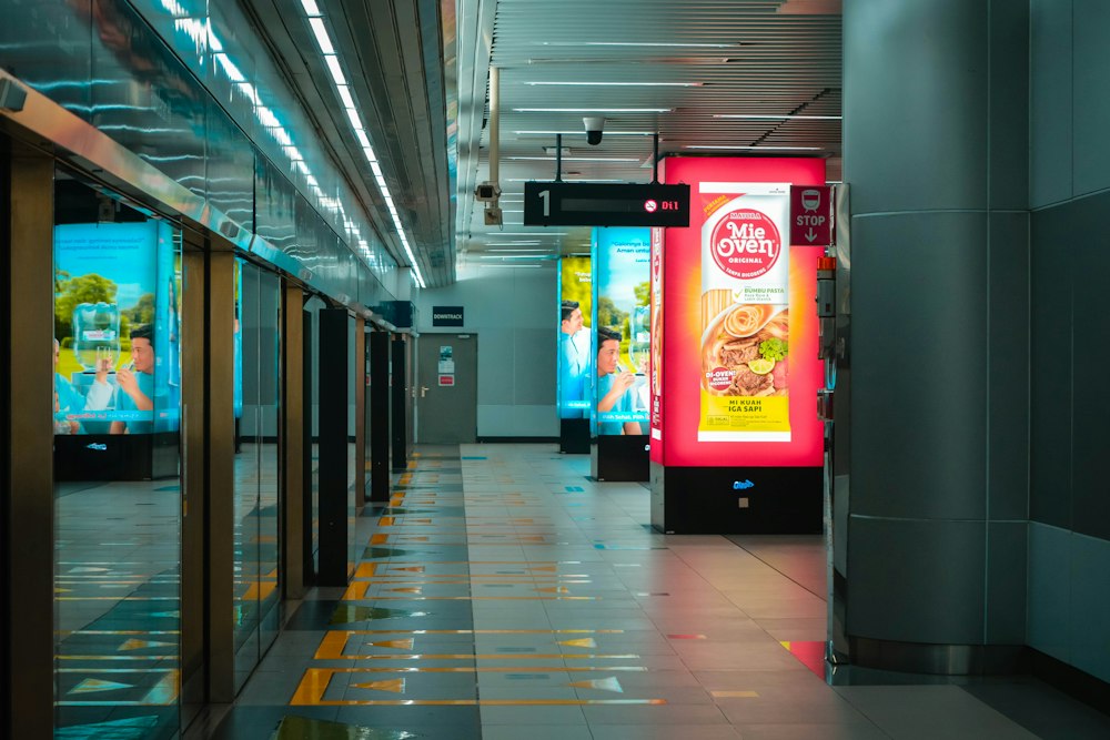 Advertising light boxes lined up in a station